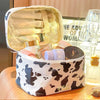 "Cow Print Waterproof Makeup Bag - Stylish and Compact Cosmetic Organizer for Women"