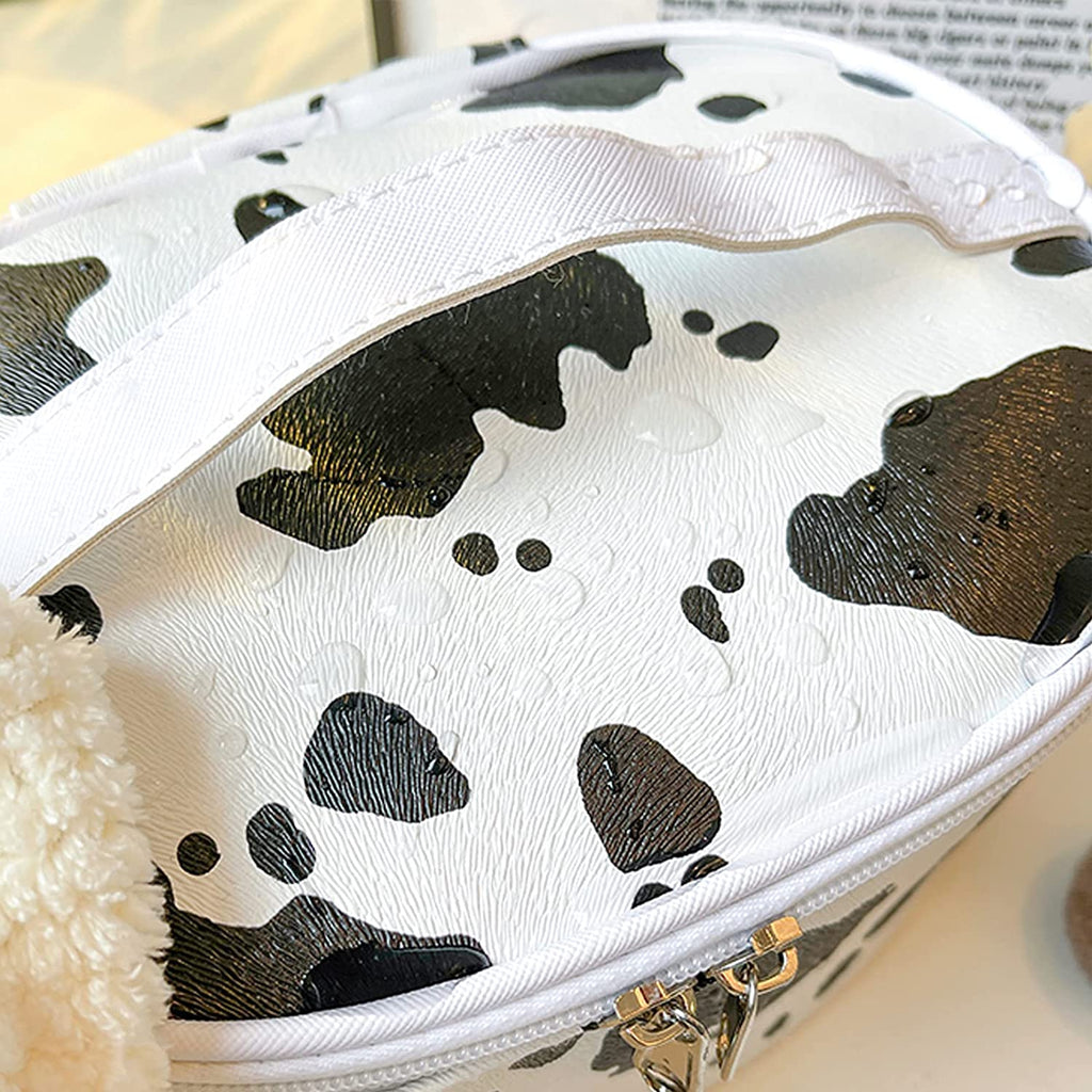"Cow Print Waterproof Makeup Bag - Stylish and Compact Cosmetic Organizer for Women"